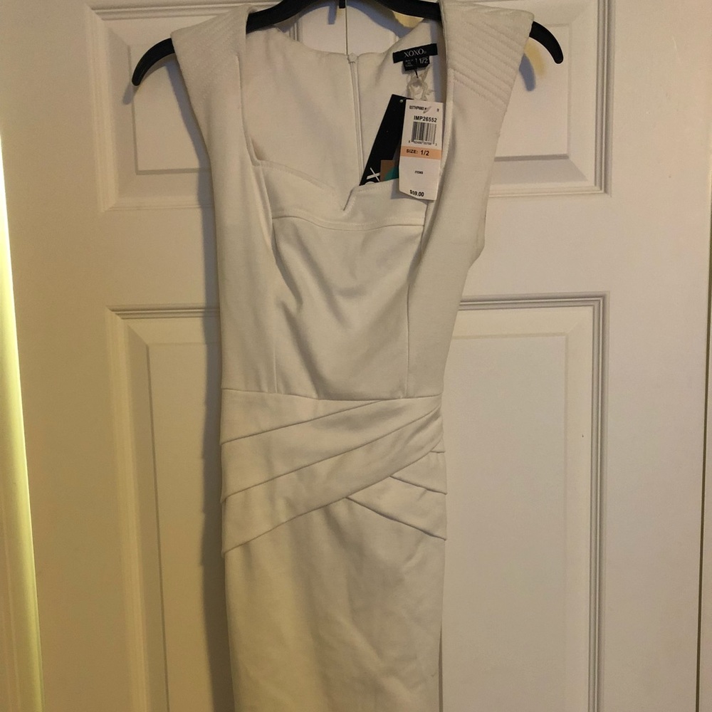 Sexy little white dress. New with tags!!